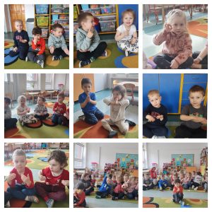 Kolejno na zdjęciach: 1. Troje dzieci siedzi na dywanie i pokazuje słowa w Polskim Języku Migowym: "zapraszam" oraz "witam". 2. Dwoje dzieci siedzi na dywanie i uczy się pokazywać w PJM słowo "smacznego". 3. Dziewczynka pokazuje w PJM słowo "dobry". 4. Czworo dzieci uczy się pokazywać w PJM słowo "przepraszam". 5. Dwoje dzieci siedzi na dywanie i pokazuje słowo "proszę". 6. Dwoje dzieci uczy się pokazywać słowo "przepraszam". 7. Dwoje dzieci ubranych na czerwono okazuje słowo "dziękuję". 8. Grupa dzieci siedzi z serduszkami w dłoniach. 9. Grupa dzieci siedzi i uczy się pokazywać słowo "kocham" w PJM.